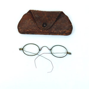Antique eyeglasses oval wire frames leather case late 1800s