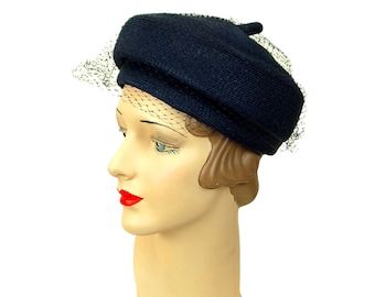 1960s straw hat tam style navy blue woven hat with veil by Jeanne' Des Mode