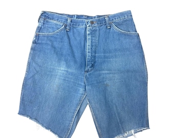 Vintage distressed denim shorts cut offs by Wrangler Size 36 waist