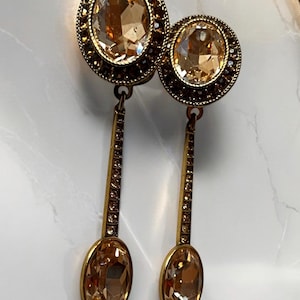 Brincos de clipe pendurados Heidi Daus Pale Topaz banhados a ouro vintage AU18