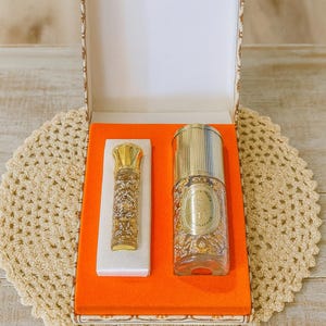 Vintage Madam Rochas Gift Set Miniature Bottle of Perfume is full-1/8 oz  Larger bottle 1/5 oz is 95% empty