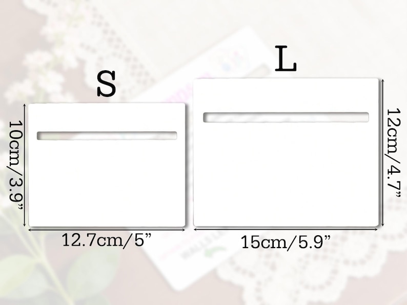 May include: Two white rectangular display stands, labeled "S" and "L", with horizontal slots. The "S" stand measures 10cm/3.9" high and 12.7cm/5" wide. The "L" stand is 12cm/4.7" high and 15cm/5.9" wide.