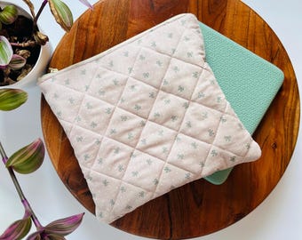Delikatne kokardki, pikowany pokrowiec Kobo Libra Color z zamkiem błyskawicznym. Pikowany pokrowiec do Kobo Libra Color, Kobo Clara Color, etui Kindle Paperwhite.