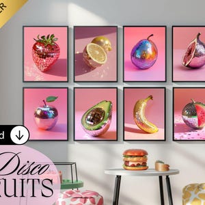 May include: Eight framed prints showcasing disco ball-style fruits, such as a strawberry, lemon, pear, fig, apple, avocado, banana, and watermelon. The artworks are set against a pink backdrop, with the text "18 Disco FRUITS" at the bottom.