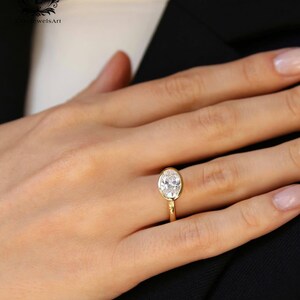 East-West Bezel Solitaire Ring | 1.50 CT Oval Moissanite Diamond | Thick Curved Band | Modern Engagement or Statement Ring
