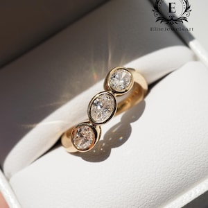 Toi et Moi Trio Bezel-ring | Oval och rund diamantvågring | Moissanit diamantförlovningsring | Modern Toi et Moi-ring | Present till henne