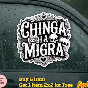 May include: A black and white sticker with the text "CHINGA LA MIGRA" in a gothic font, surrounded by roses, hearts, and skulls. The sticker is waterproof and can be used as a magnet. The sticker is on a car window.