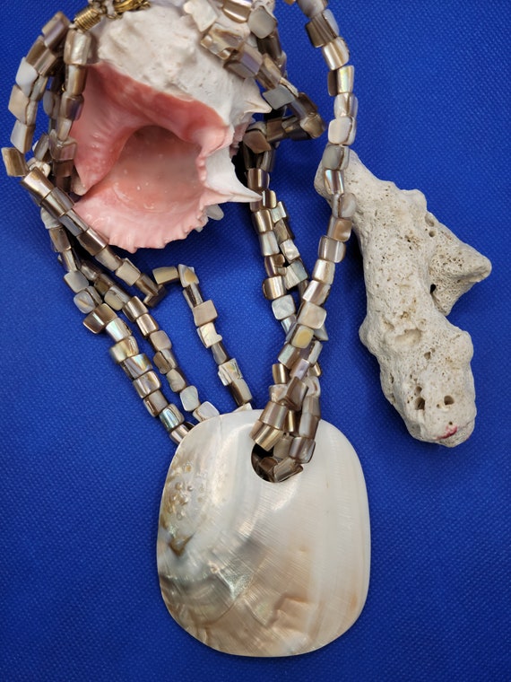 mother of pearl disk Gem