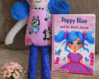 Muñeca de tela azul amapola hecha a mano: cara bordada y libro de cuentos. Un regalo único.