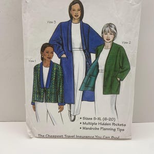 May include: A pattern envelope for the "Journey Jacket" by SAF-T-POCKETS Travelwear. The cover features illustrations of three jacket styles in blue, green, and patterned fabrics. Text includes "Sizes S-XL (6-20)" and "Multiple Hidden Pockets."