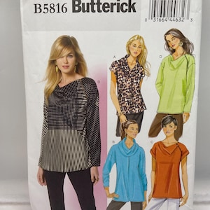May include: A Butterick sewing pattern, B5816, featuring illustrations of various women's tops. The pattern includes a long-sleeved top with a polka dot and striped design, a leopard print top, a green top, a blue cowl neck top, and an orange top.