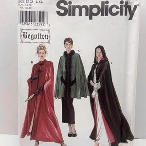 May include: Simplicity sewing pattern 8987 featuring cape designs. The pattern includes illustrations of capes in red, green, and black. The pattern size is BB L, XL, with European sizes 44-50 and French sizes 46-52. The brand name "Simplicity" is prominently displayed.