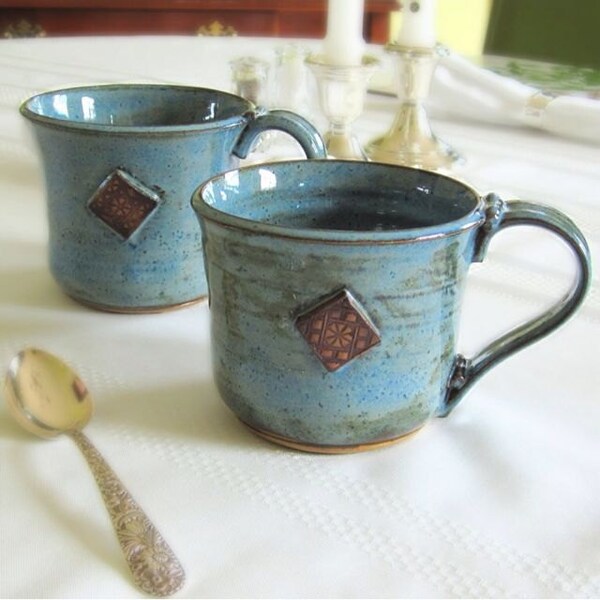 Set of Two Blue Pottery Mugs with an Architectural Tile