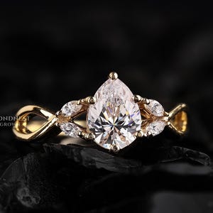 Leaf Style Pear Cut Lab Diamond Engagement Ring: 14K Gold Twisted Band