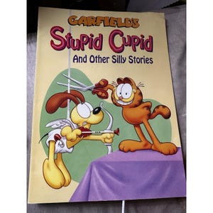 Garfield&#39;s Stupid Cupid and Andere Silly Stories Softcover Buch von Jim Denims 1995