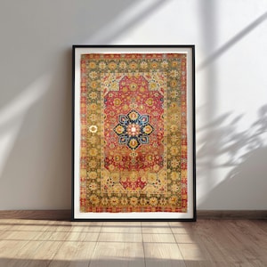 May include: A rectangular area rug featuring a vibrant red central field with a dark blue floral medallion. The rug is framed by a wide, intricate border in shades of olive green, gold, and red, all enclosed within a simple black picture frame.