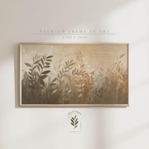 May include: A framed print with a beige background and a painting of green leaves. The text "My people will live in peaceful dwelling places, in secure homes and fertile ground, in places of abundance." is printed on the right side of the print.