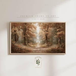 Puede incluir: Una impresión artística enmarcada que presenta una serena escena de bosque con un camino que conduce a una figura en la distancia. La obra de arte es predominantemente en tonos cálidos de marrón y dorado, con el texto "I AM THE WAY AND THE TRUTH AND THE LIFE" en la parte inferior.