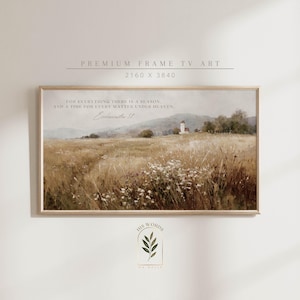 May include: A framed landscape print featuring a field of tall grass and wildflowers, with a church in the distance. The print includes the text "FOR EVERYTHING THERE IS A SEASON, AND A TIME FOR EVERY MATTER UNDER HEAVEN. Ecclesiastes 3:1".