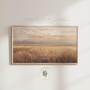 May include: A framed landscape print featuring a field of tall grass under a sunset sky with flying birds. The print includes the text "FROM THE RISING OF THE SUN TO ITS SETTING, THE NAME OF THE LORD IS TO BE PRAISED. Psalm 113:3."