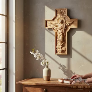 May include: A wooden wall cross featuring a carved depiction of Jesus with outstretched arms, set against a light background. The cross is intricately detailed with religious iconography. The image also shows a vase with flowers and a book.