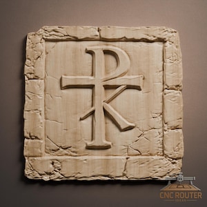 May include: A light-colored wooden plaque featuring the Chi Rho symbol, a monogram of Christ. The symbol is carved in relief within a rectangular frame with a textured, stone-like appearance. The plaque has a rustic, aged aesthetic.
