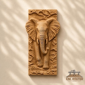 May include: A rectangular light brown wooden wall plaque featuring a high-relief carving of an elephant head and front legs. The elephant is depicted with large ears and tusks against a textured background. The text CNC ROUTER IDEAS is visible.