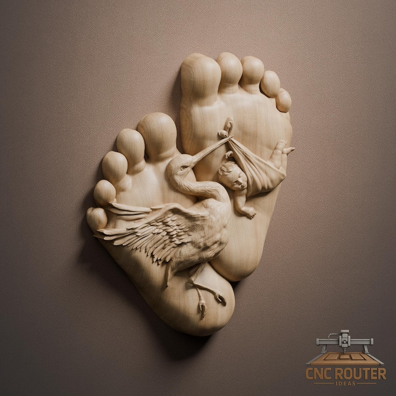 May include: A wooden carving depicting two large footprints with a stork carrying a baby in a blanket. The stork is positioned between the footprints, and the baby is held in its beak. The carving is made of light-colored wood.