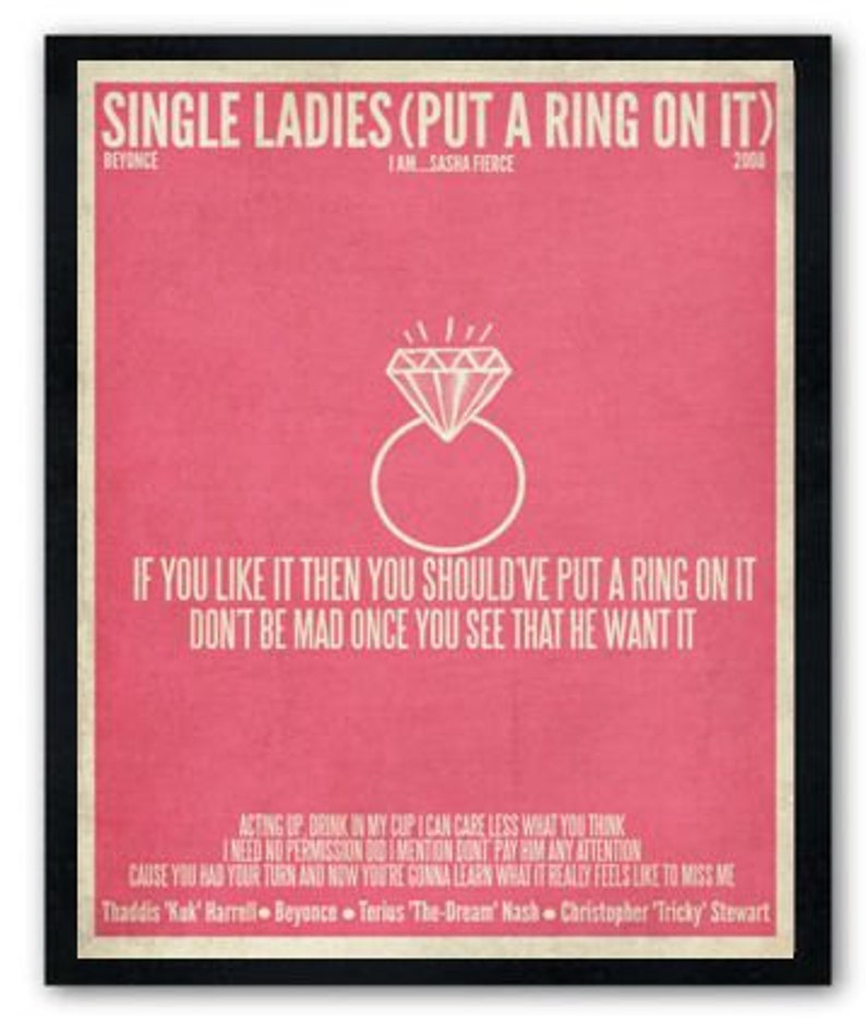 May include: A pink poster with white text that reads "Single Ladies (Put a Ring On It)" by Beyonce. The poster also includes the lyrics "If you like it then you should've put a ring on it. Don't be mad once you see that he want it."