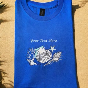Adult cotton T-shirt with embroidered shells and your text or name