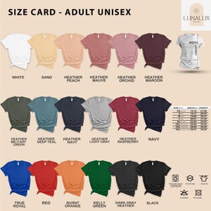 a collection of t-shirts in various colors and styles, including white, sand, peach, maroon, and navy, as well as a size card for an adult unisex t-shirt.