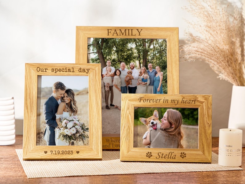 May include: Three wooden picture frames with engraved text. The top frame says "FAMILY". The middle frame says "Our special day 7.19.2023" and the bottom frame says "Forever in my heart Stella".