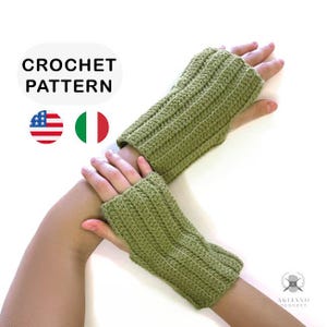 May include: A pair of olive green crochet fingerless gloves. The gloves are ribbed and have a simple design. The image includes the text "CROCHET PATTERN" and the American flag.