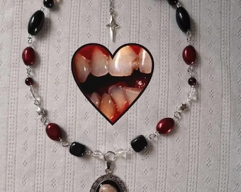Black vampire tooth pendant necklace