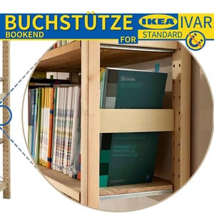 May include: A wooden bookshelf with a woven cane back panel. The shelf is labeled "BUCHSTÜTZE BOOKEND FOR IKEA IVAR STANDARD". The shelf is filled with books.