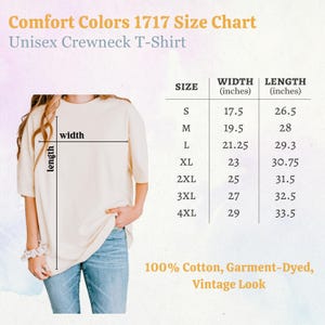 May include: A cream-colored unisex crewneck t-shirt with a size chart. The chart lists sizes S to 4XL, with corresponding width and length measurements in inches. The text reads "100% Cotton, Garment-Dyed, Vintage Look."