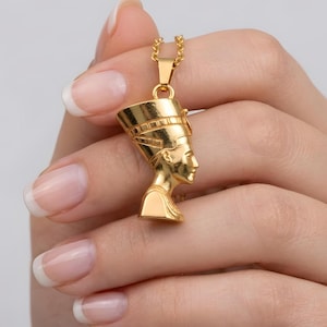 Handmade Nefertiti necklace in a brilliant polished shiny gold finish. A 24K gold plated Egyptian queen necklace for women, designed as a luxury anniversary gift for her. This shining gold necklace for mom is a standout piece of spiritual jewelry, ideal for special occasions and meaningful gifting.