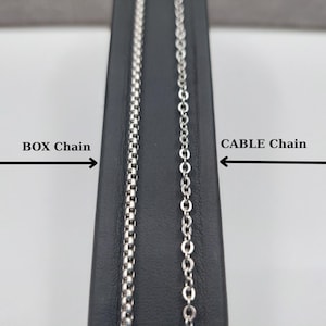 High-quality silver-tone stainless steel necklace chains in various lengths and styles. Durable, tarnish-free, and waterproof silver color chains with a secure clasp. Hypoallergenic and lead-free jewelry for sensitive skin, ideal for pairing with a cross or mythological pendant.