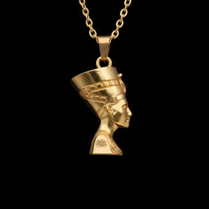 Handmade Nefertiti necklace available in both matte and shiny 24K gold plated finishes. Whether you select the polished or matte gold necklace for women it serves as a stunning anniversary gift for her. These ancient Egyptian necklaces are high quality gifts for mom handcrafted for those who love unique spiritual jewelry.