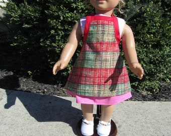 Doll Aprons in four different colors and prints made to fit 18" or 15" dolls like American Girl, Our Generation, Bitty Baby etc.