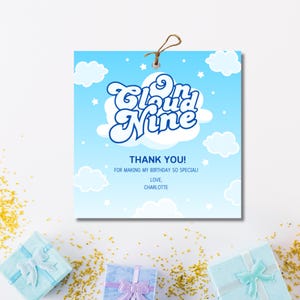 May include: A square gift tag with a blue sky background and white clouds. The tag reads "Cloud Nine" in a whimsical font, with the text "Thank You! For making my birthday so special! Love, Charlotte."