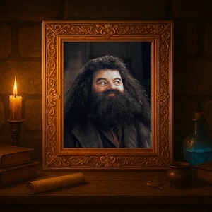 May include: A framed portrait of a man with a long black beard and hair. The portrait is in a gold ornate frame, sitting on a wooden table with books, a candle, and a potion bottle. The scene is dimly lit.