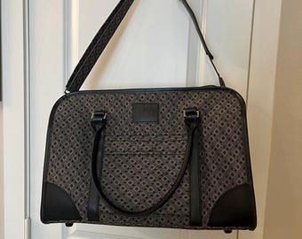 Joy Mangano Weekender Travel/Overnight Bag features a Black and Tan design