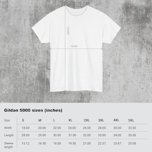 May include: A white Gildan 5000 t-shirt with measurements for width, length, and sleeve length in inches. Sizes range from S to 5XL. The shirt is displayed on a gray background.