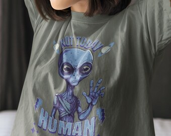 May include: A gray t-shirt with a blue alien graphic and the text "Not Today Human".