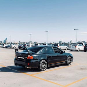 Subaru Legacy rear spoiler 2003–2013, Glossy Black finish, shipped worldwide with tracking, delivery time may vary by customs