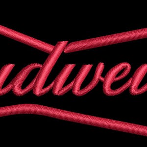 May include: Red embroidered "Budweiser" logo on a black background. The logo features the brand name in a cursive font, enclosed within a stylized, diamond-shaped frame. The embroidery has a textured appearance.