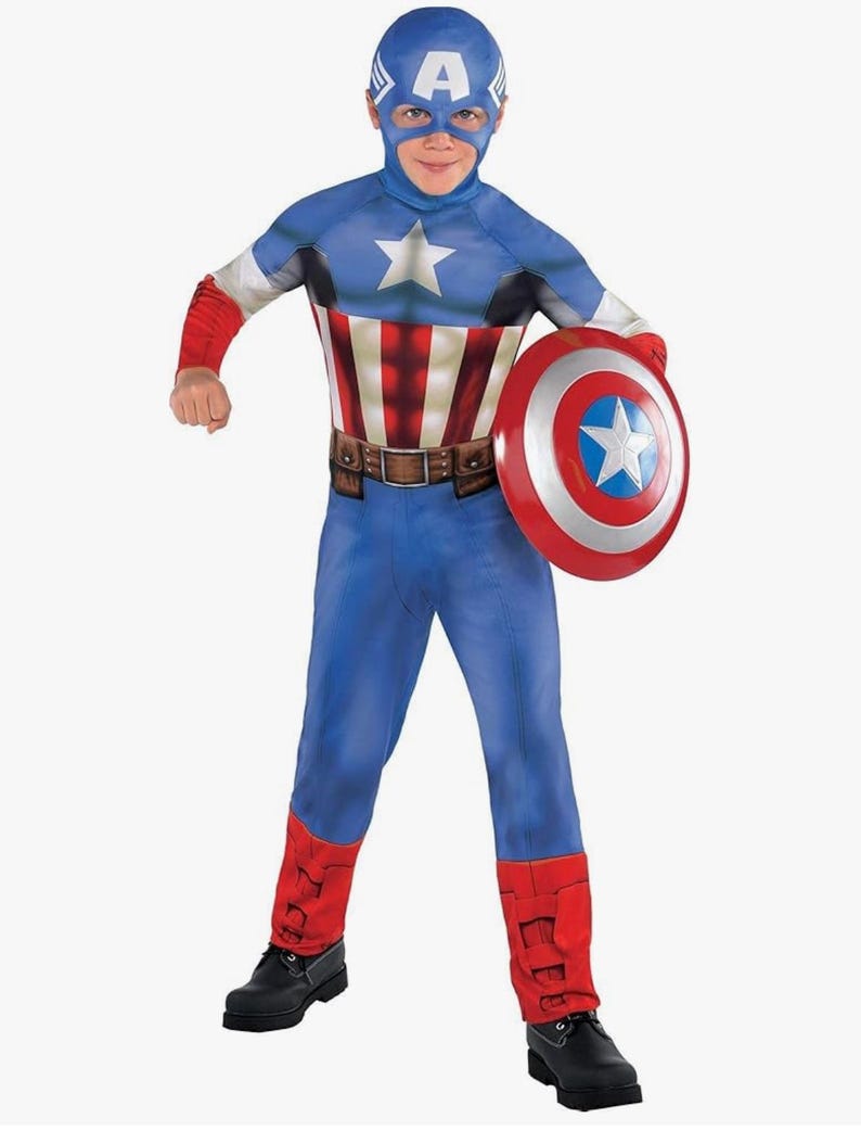 May include: A blue Captain America costume with a matching mask, a white star on the chest, and a red, white, and blue shield. The costume includes a brown belt, red accents, and black boots.