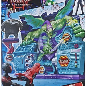May include: Spider-Man Into the Spider-Verse Super Collider Playset box. The box features illustrations of Spider-Man, Miles Morales, and villains. The playset includes figures and a battle scene with sound effects.