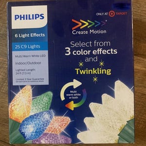 May include: A blue box of Philips C9 LED Christmas lights. The box features the Philips logo, product details, and the text "Create Motion." The lights offer 6 light effects, 25 lights, and a lighted length of 24 ft.